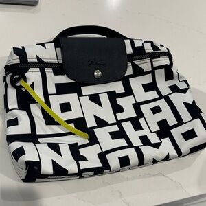 Longchamp Graphic Black and White Pouch with Yellow Accent cosmetic toiletry